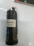 Small towel hair elastics in cylindrical container