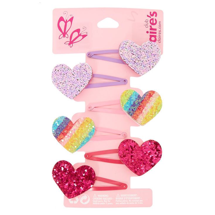assorted modern snap hair clips for children featuring glittery heart and character embellishments